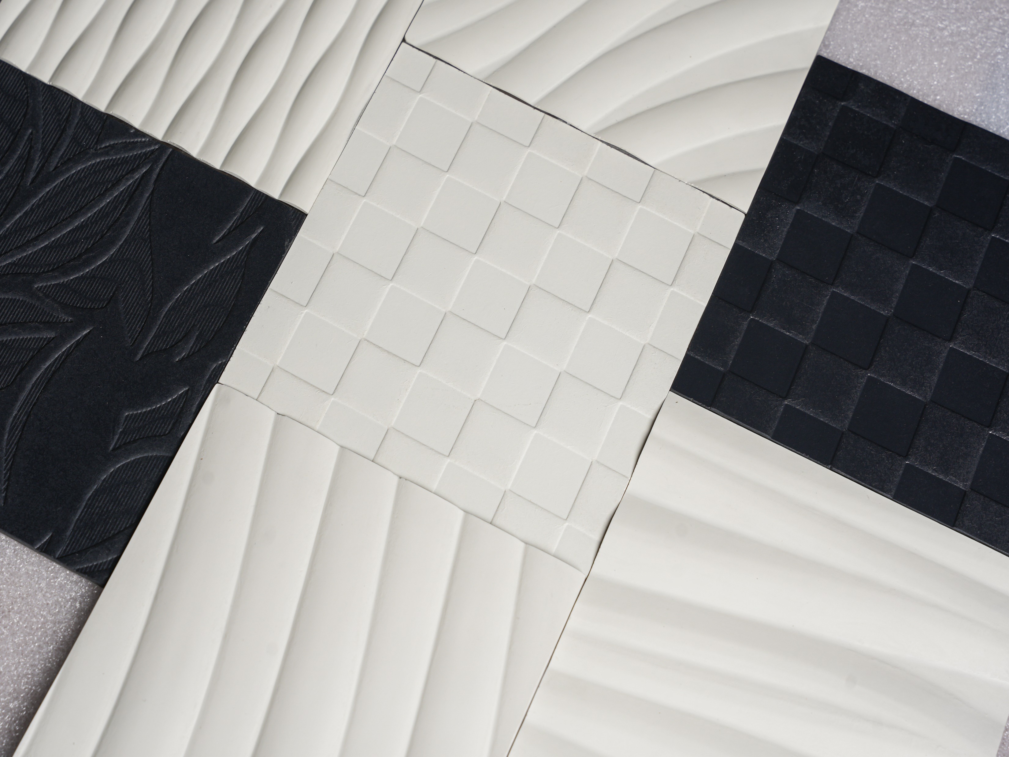 Crystal-Quartz Bonded surface samples in white and charcoal